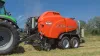 KUHN VBP 3260 baler-wrapper combination wrapping silage bales.